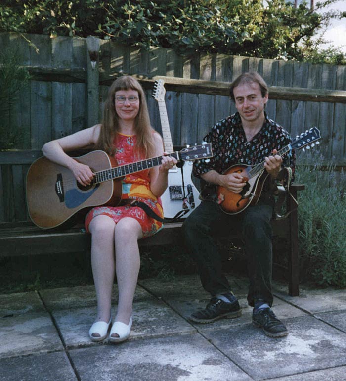 Picture of Annabel and John playing guitar