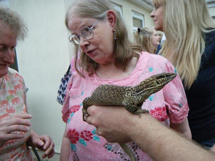 Picture of Annabel meeting a monitor lizard